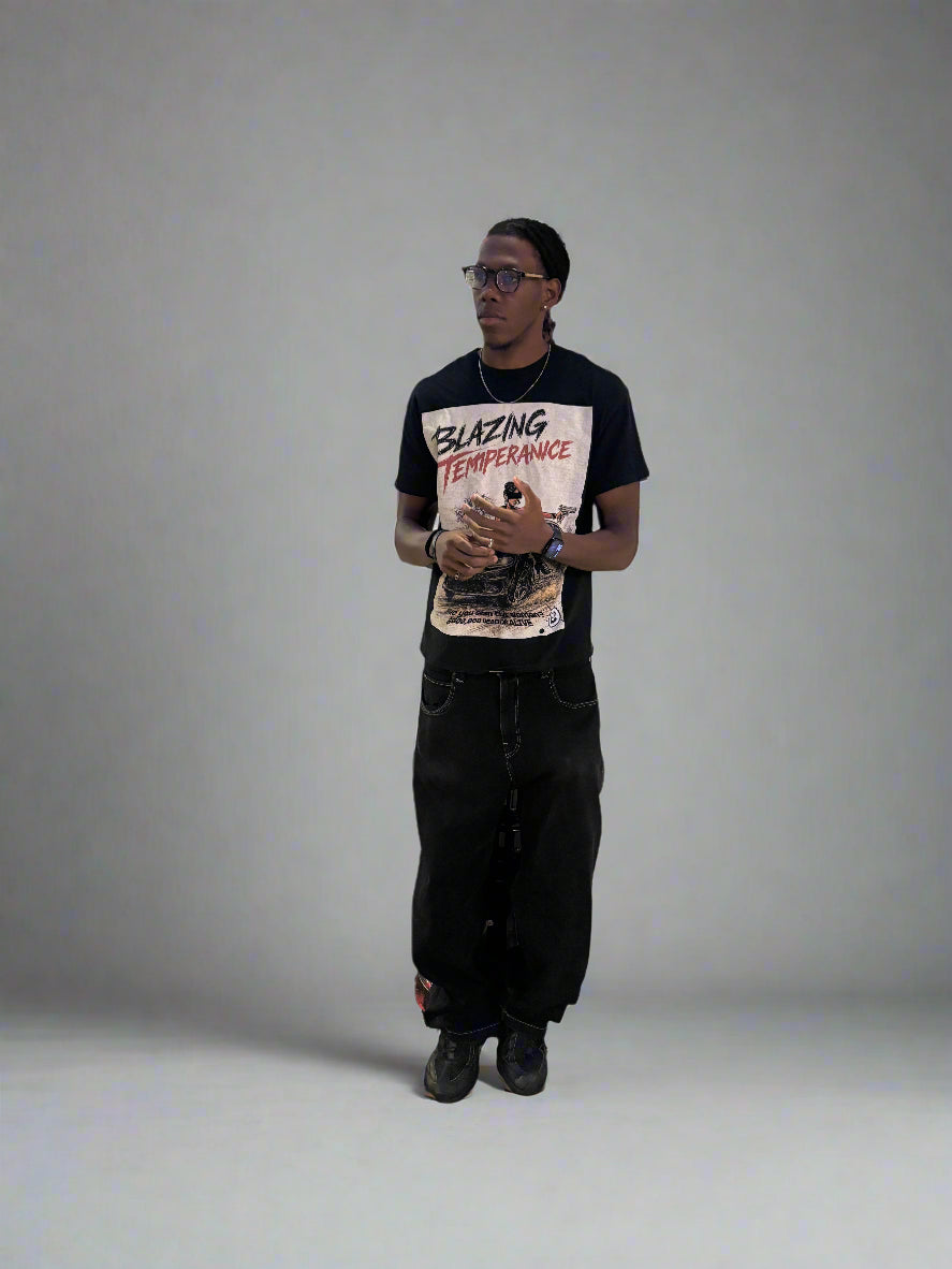 person wearing trendy graphic tee in studio room